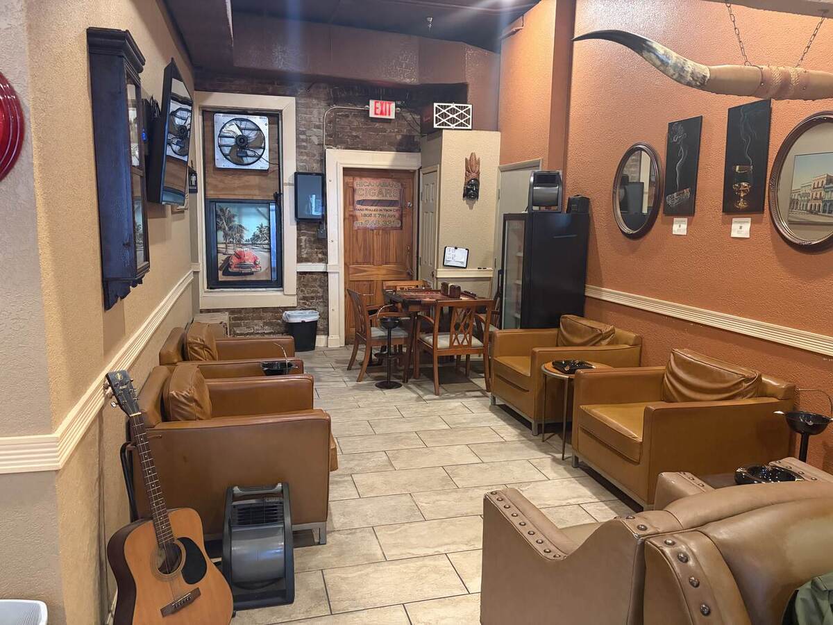 The back lounge at Nicahabana Cigars, seating and live music corner